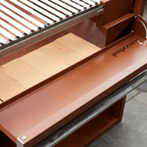 Barbecook Pedro firestones fitted inside the barbecue